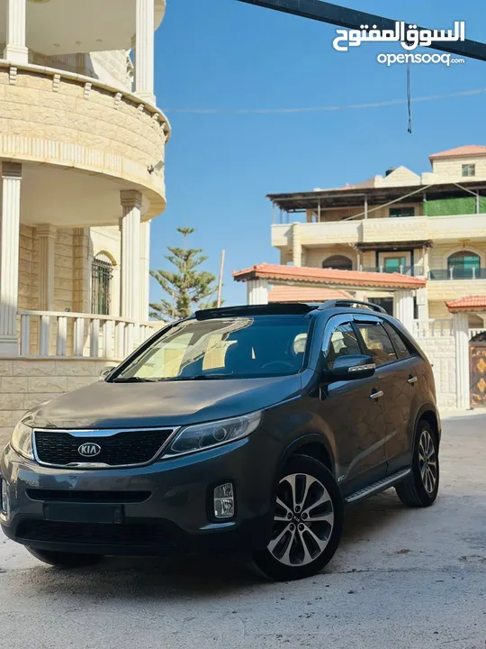 كيا سرنتو 2015ترخيص2014 للبيع المعني حيا الله ترخيص وتأمين هديه سنه الجب بحاله ممتازه  فل الفل الجيب