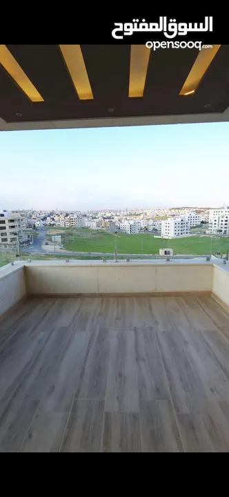 شقة مميزة طابق ثاني مساحة 206 م - طريق المطار - مقابل سوبر ماركت 911-سكن أ - شركة رمضان مميل للاسكان