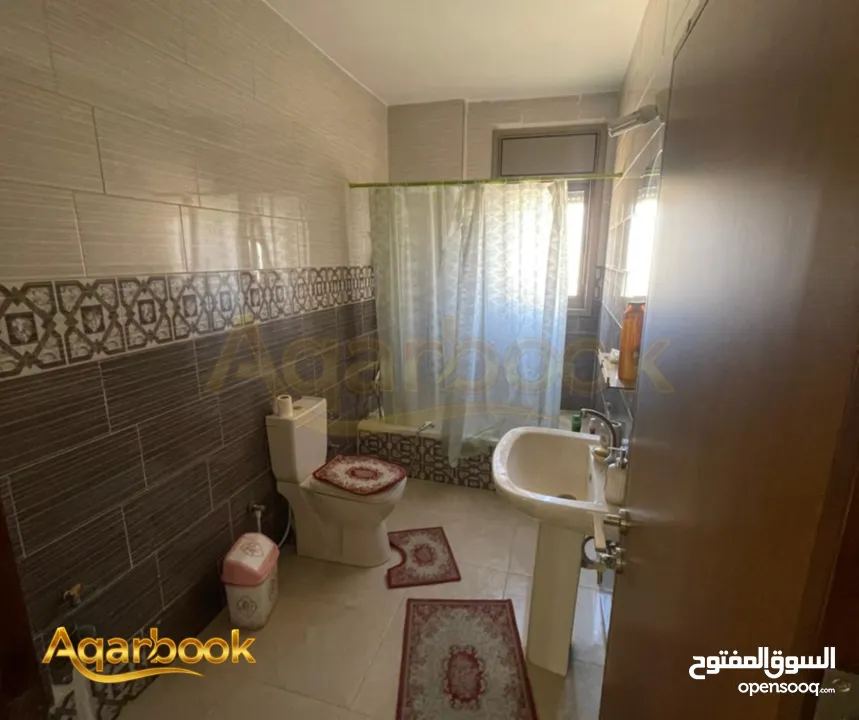 شقة مميزة بإطلالة رائعة بانتظارك!   أم الشرايط – قرب دوار الأمين