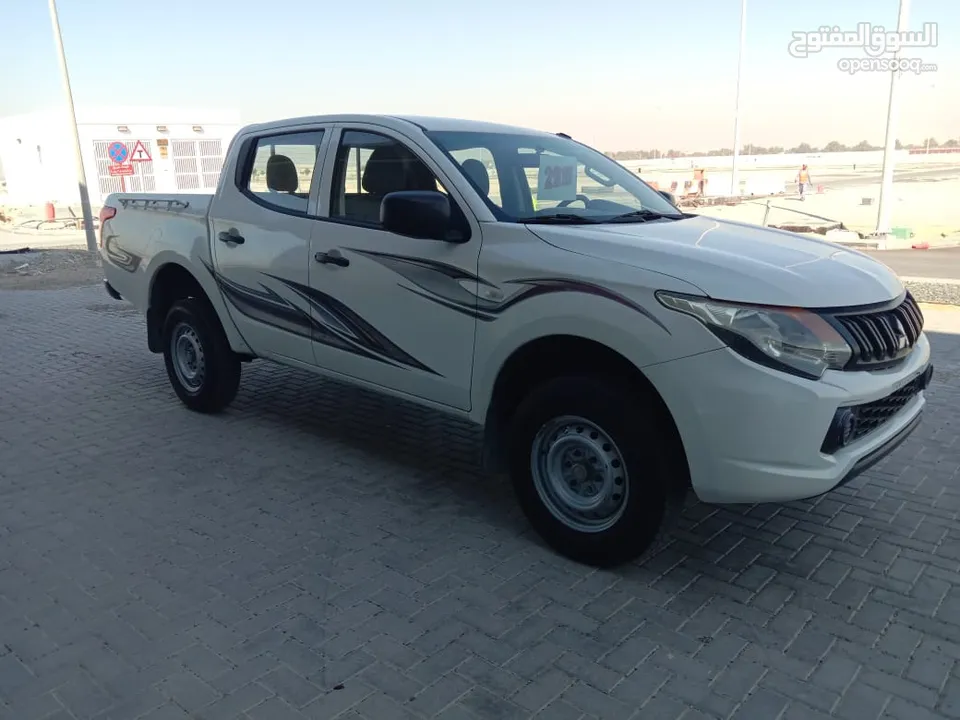 ميتسوبيشي L200 4\4 دبل كابينة زجاج كهرباء