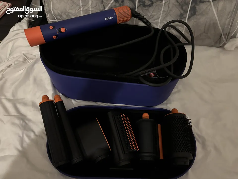 مصفف شعر من Dyson اصلي بجميع أغراضه
