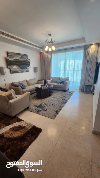 شقه سكنية للبيع في مسقط جراند مول مبنى 8 مساحة كبيره مؤثثة ومكيفه فاخره