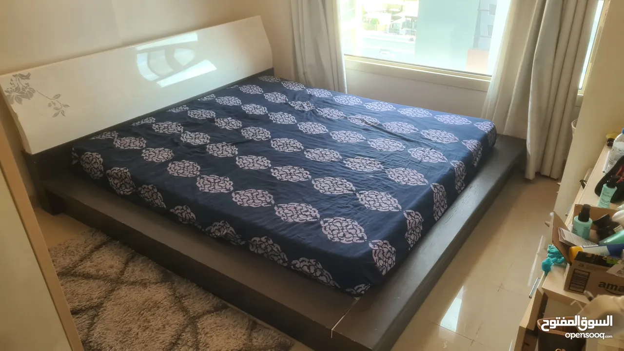 King size frame with mattress for throw away price 200 dirham only