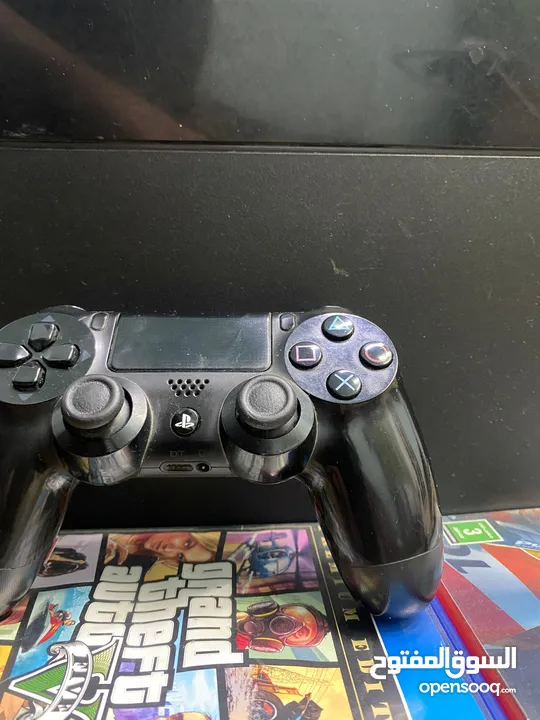 ps 4 with controller and gaming headphones in good condition