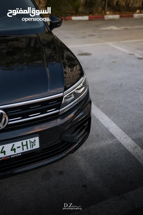 VW TIGUAN R_LINE  2000CC GASOLINE  4X4  امكانية البيع بدفعة اولى والباقي لغاية 4سنوات =48 شهر