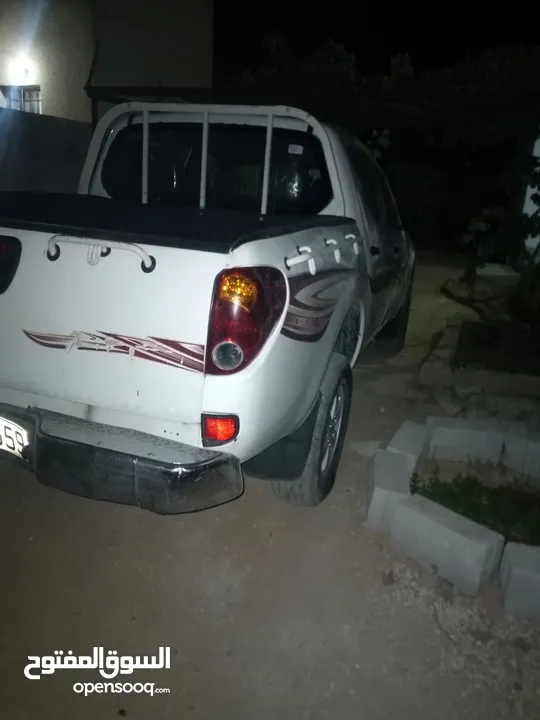 بك اب متسوبيشي   l200 موديل 2009 فور ويل 4X4
