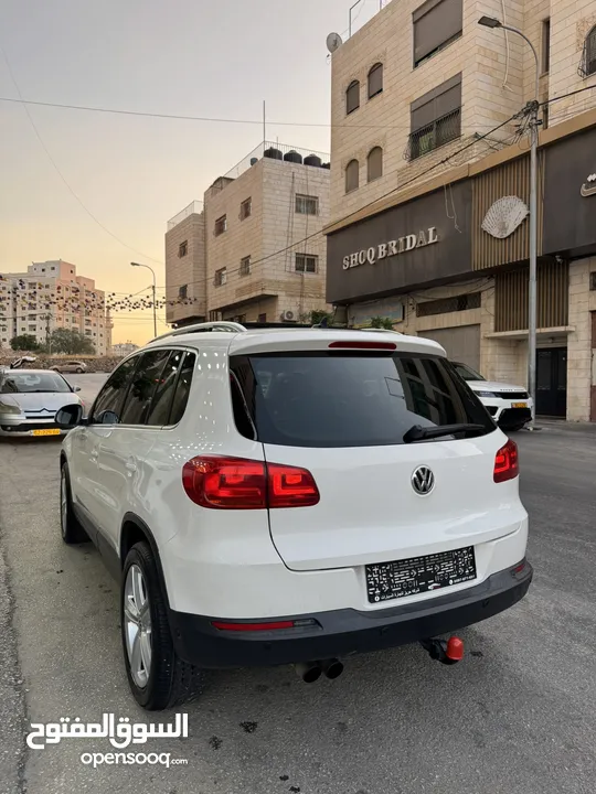 فوكس فاجن تيجوان 2012 بنزين متور 2000 تيربو 4x4 فتحة سقف بانوراما فرش بني مميز عداد قليل فحص ممتاز