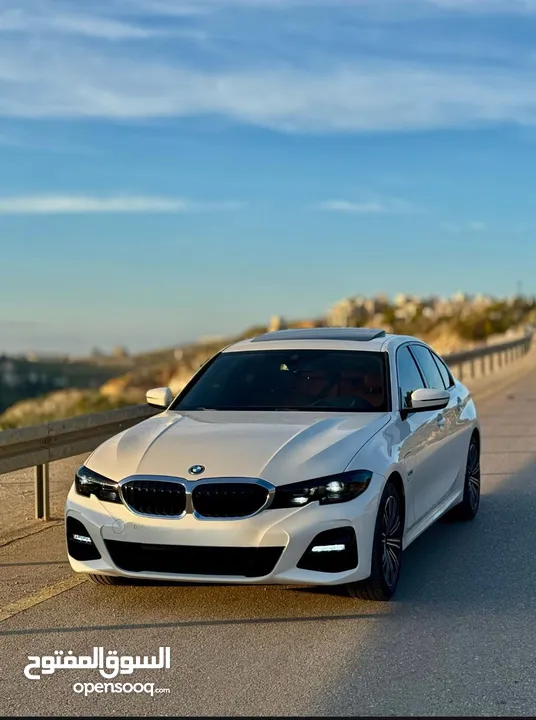 BMW 330e M package 2021 XDrive plagein haypred  4*4