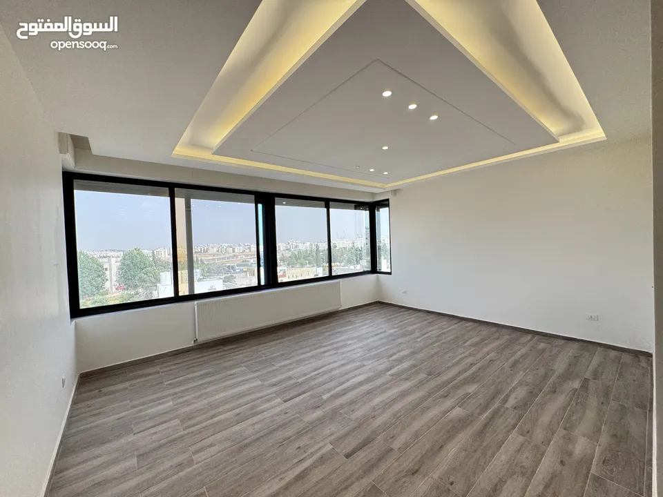 شقة دوبلكس مع روف باطلالة مميزة مساحة 280 + 90 باجمل مناطق رجم عميش - حي الصحابة -شركة رمضان للاسكان