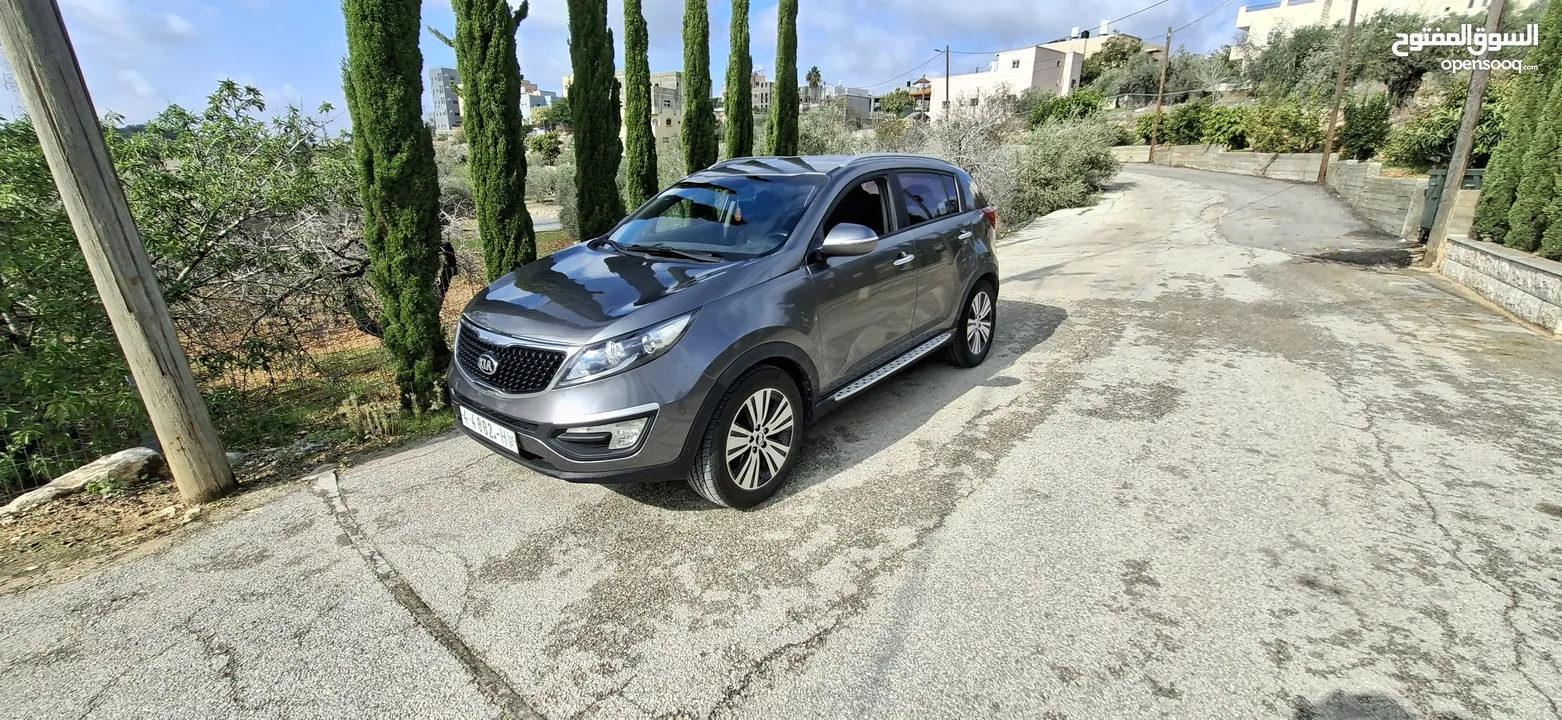 جيب كاياسبورتاج موديل 2014-اتومتيك'دفع 4×4 ماتور 2000ديزل فل فل اضافات ماعد الفتحة - نظيف من الاخر