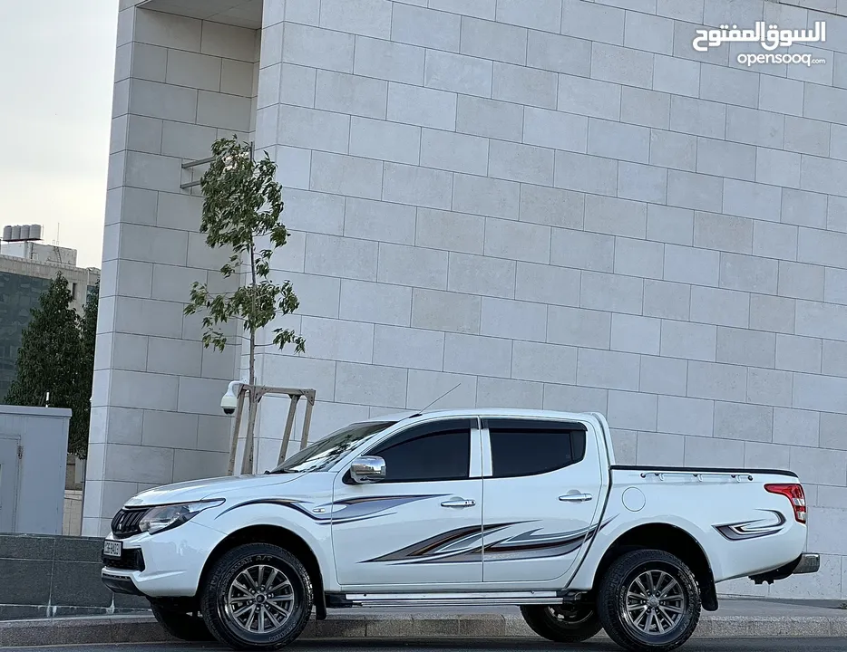ميتسوبيشي L200 2016 لون ابيض مميزه فحص كامل كرت ابيض 7 جيد دفع رباعي 4x4
