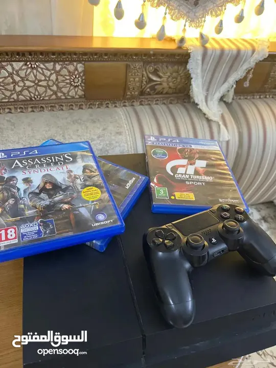 Ps4 Fat  معها يد الأصيلة وألعاب..
