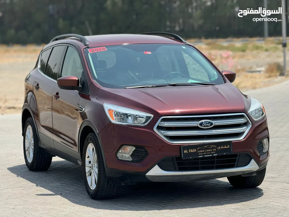 Ford Escape  / 2018 /  v4 perfect condition  / 28000 aed /