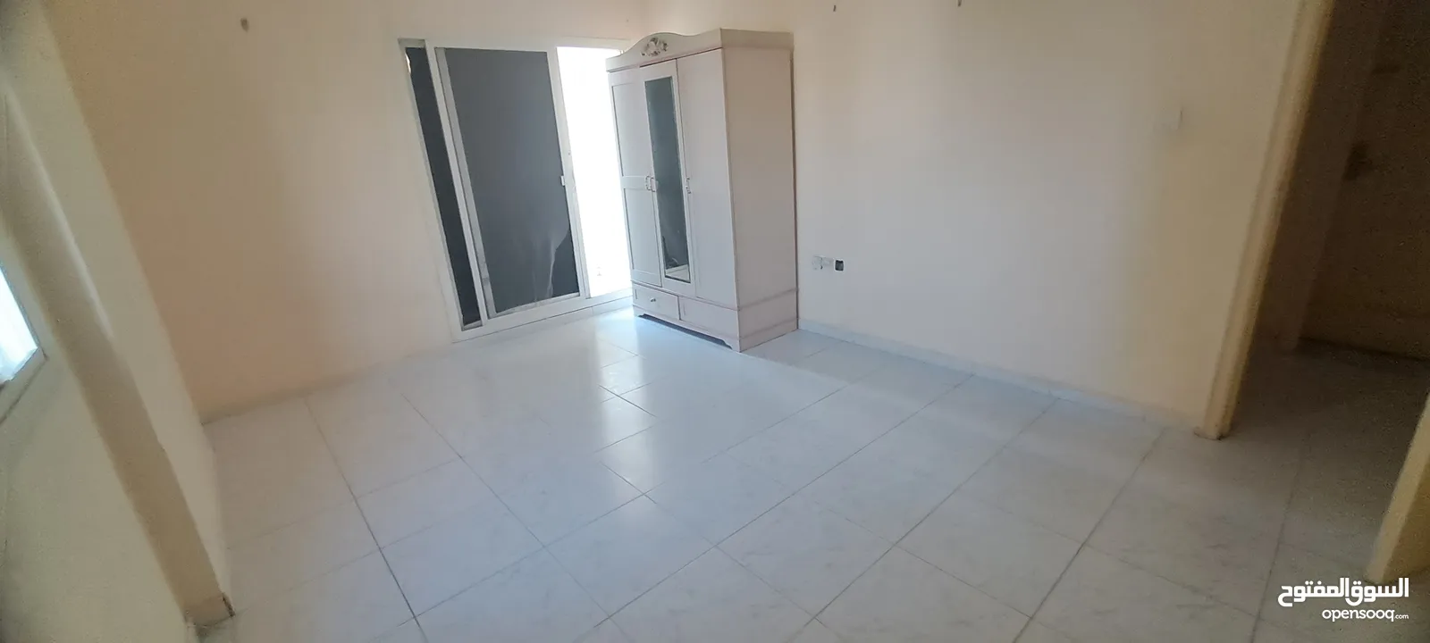 Bed space available in  (FLAT)  ajman Liwara 2,back side ADCB bank, Near Lulu center   {Free  WiFi,