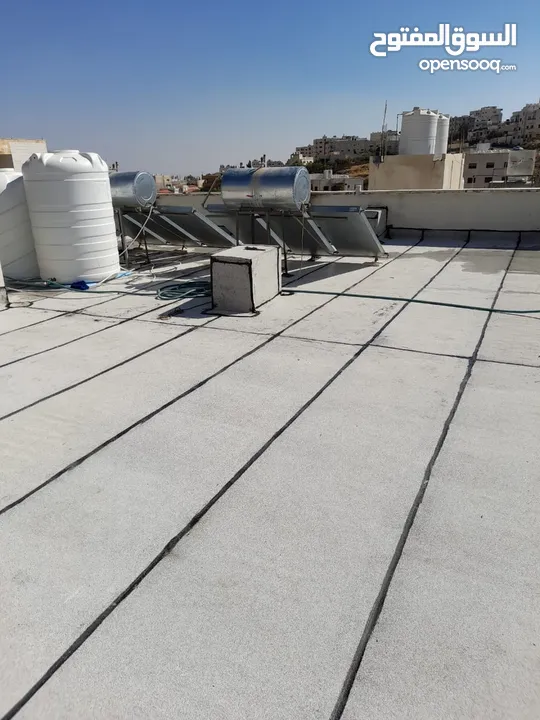 ابو علي لعزل الاسطح بالزفتة الساخنة والرولات وصيانة الشوارع وخلط اسفلت