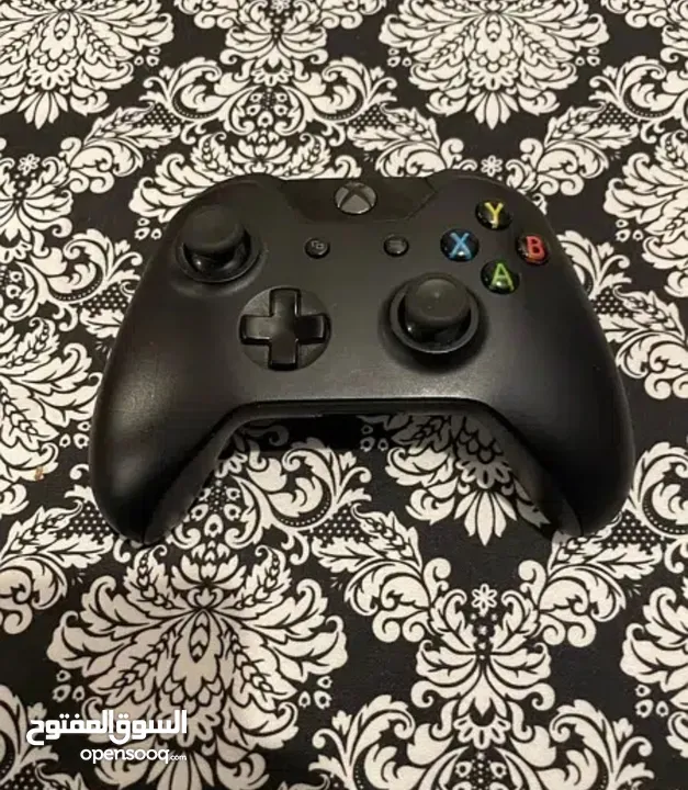 Xbox one with controller and wires