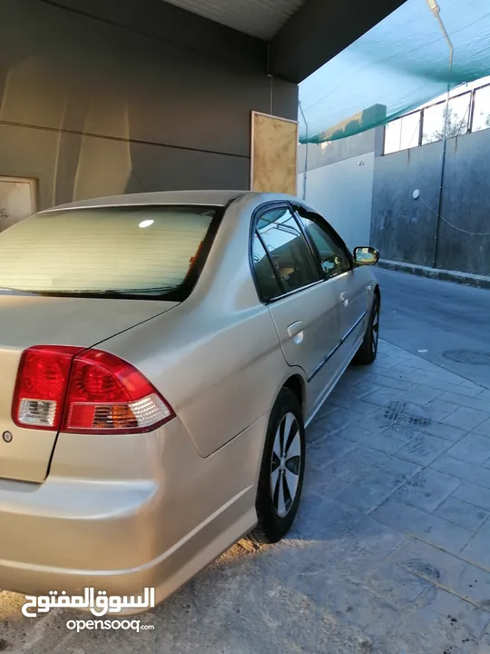 هوندا سيفيك 2004...للبيع او .....للبدل ع فورد cmax............