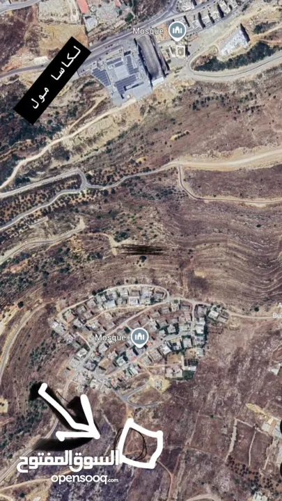 ارض على قمة الجبل اراضي المزرعة مقابل لكاسا مول على شارعين هيكليين دونم صافي بعد الشوارع تصنيف سكن أ