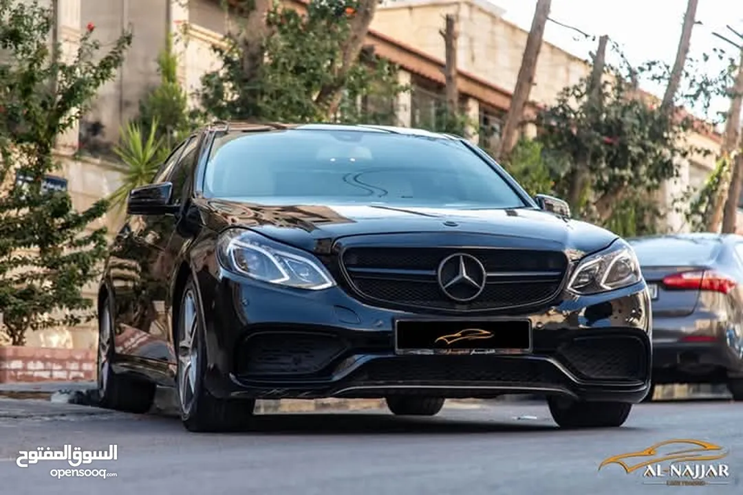 Mercedes E200 Avantgarde Amg kit 2015  السيارة وارد و بحالة الوكالة