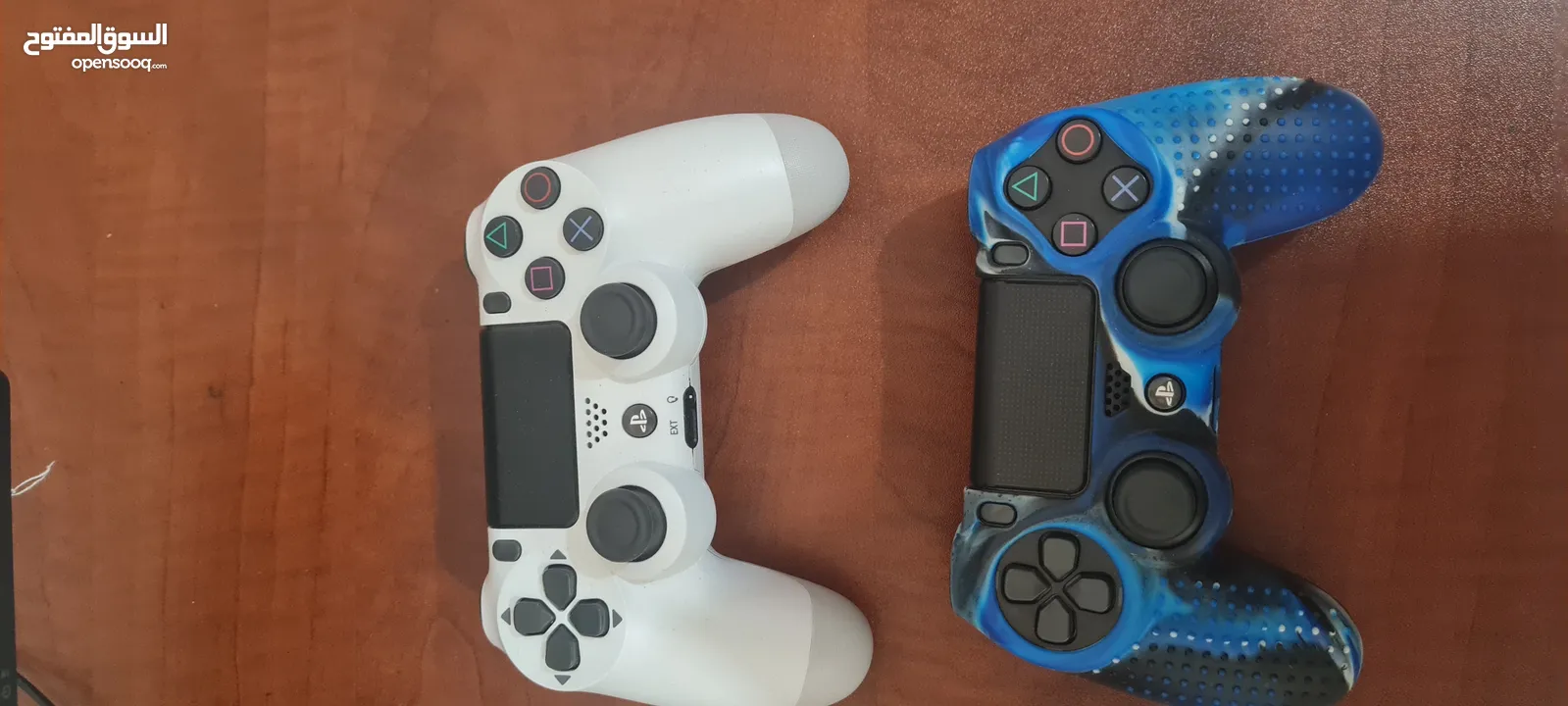 playstation 4 slim 500gb with 2 controllers and 7 games