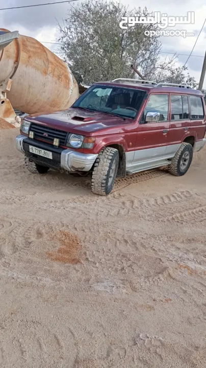 ميتسوبيشي باجيو1999  جير اتوماتيك 7 ركاب غرفه جلد عسليه  جير ومطور جاد مركبات