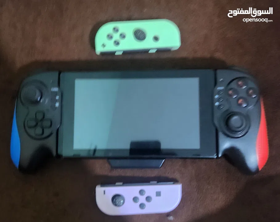 نينتندو سويتش مع كينترولارنينتندو سويتش مع كينترولارنينتندو سويتش مع كينترولار