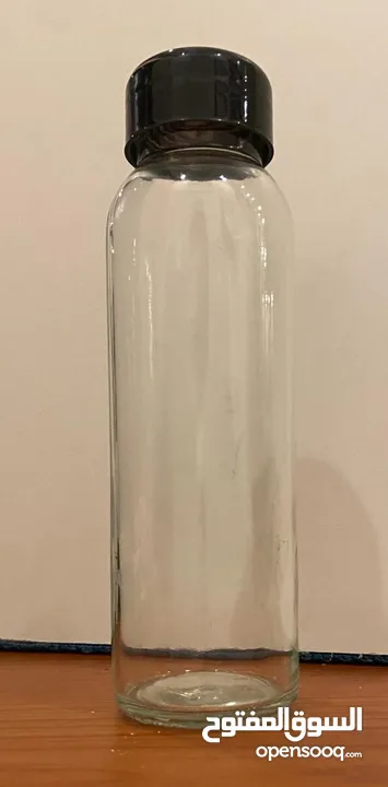 عدد 24) زجاجات زجاجية أنيقة مع أغطية )Elegant glass bottles with covers