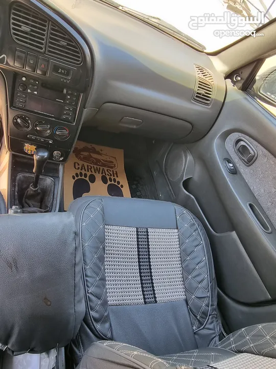 كيا سبيكترا 2001 بسعر 2400 جير عادي سياره نظيفه جدا  kia spectra 2001