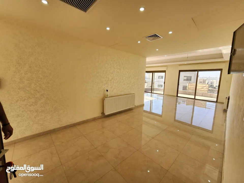 شقة مع روف منفصلين للبيع في دير غبار ref: 14232
