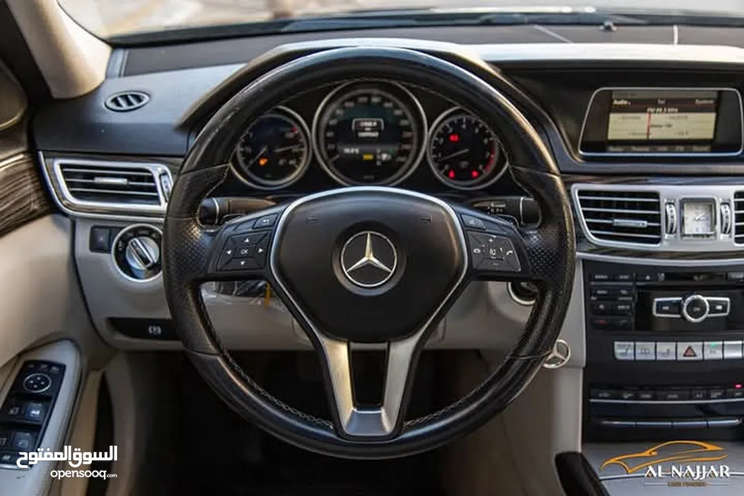 Mercedes E200 Avantgarde Amg kit 2015  السيارة وارد و بحالة الوكالة