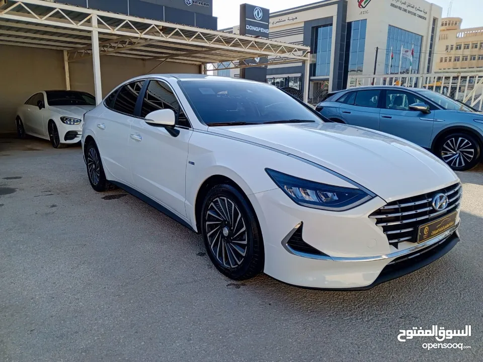 SONATA HYBRID 2020 ابيض لؤلؤي كوري  عداد 32 الف كيلو