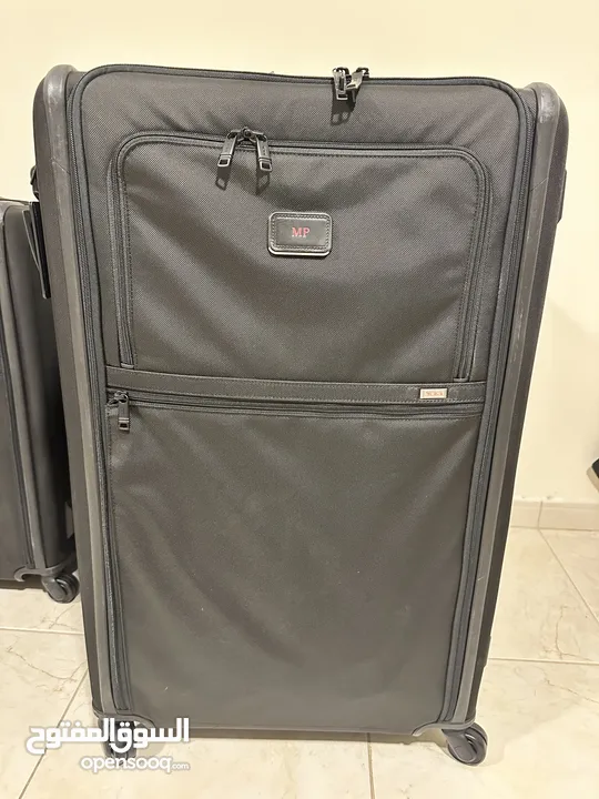 TUMI suitcases