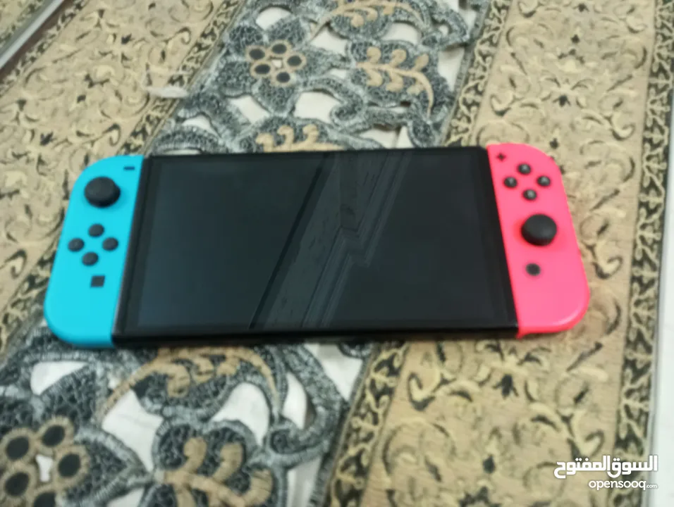 نينتندو سويتش OLED مستعمل 3 شهور جديدة مع ضمان مع الملحقات ( اكسسوارات) فقط ب 850 شيكل