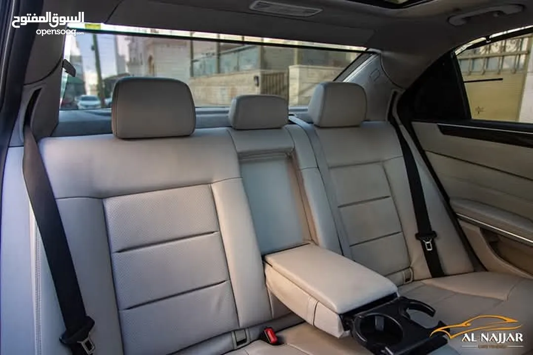 Mercedes E200 Avantgarde Amg kit 2015  السيارة وارد و بحالة الوكالة