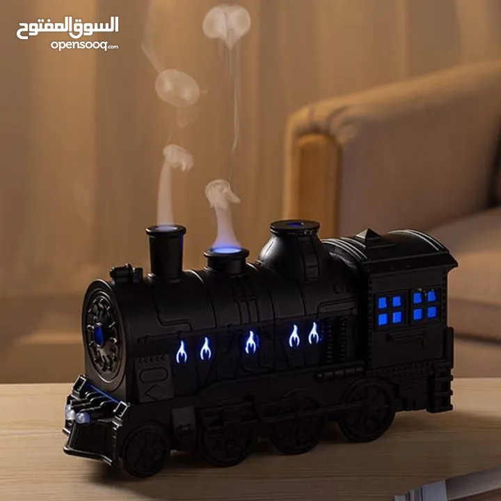 قطار البخار الصغير مش بس ملطف جو... تحفة فنية تنفث راحة وعطر! عيش تجربة بخار خرافية... جو دافئ،