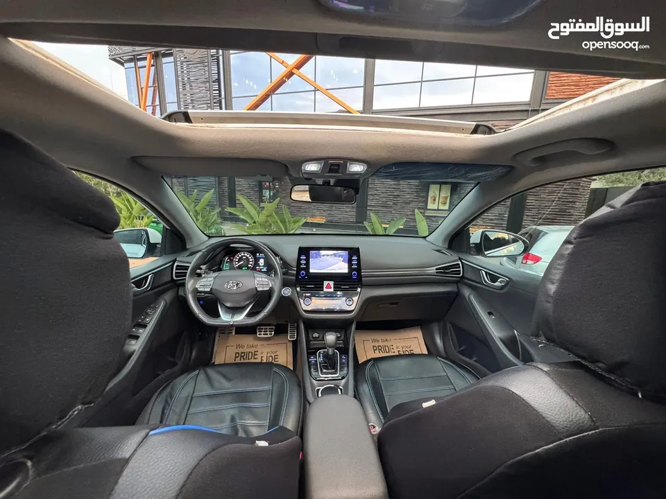 هيونداي أيونيك هايبرد مع فتحة سقف عداد قليل  بطارية مكفولة حتى 2028 و أعلى فئة إضافات و بسعر آلعرض