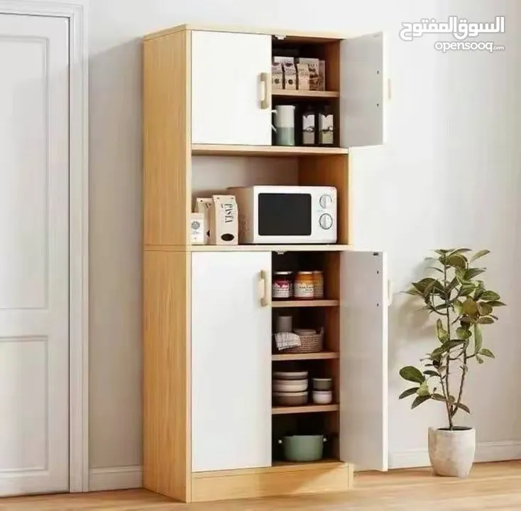 قدّمنا لك خزانة مطبخ خشب بـ 4 أبواب + رف وسطي بتصميم عملي وعصري الأبعاد: 150×30×60 سم