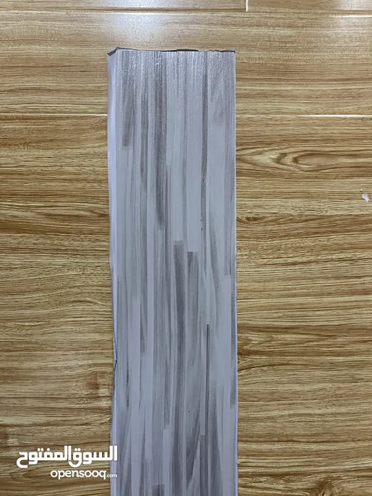 ارضيات لاصقة باركية وبورسلان