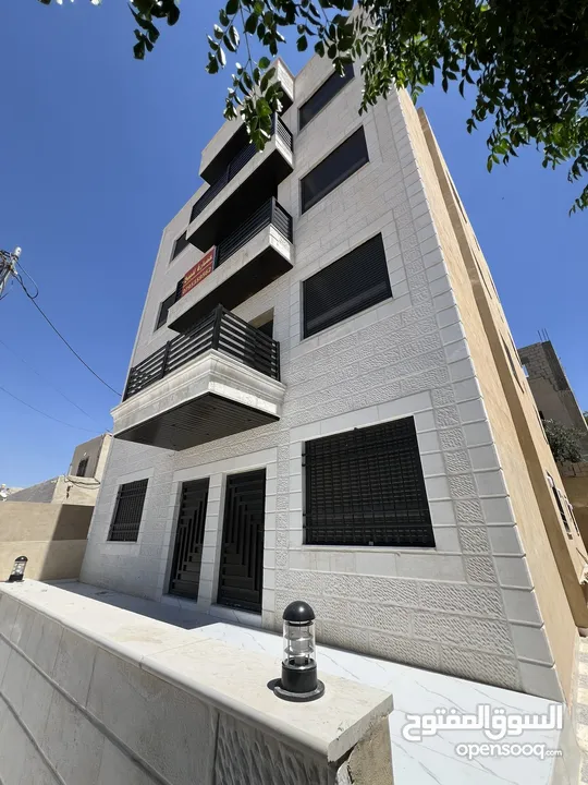 عمارة للبيع أربع شقق طابقية مساحة الشقة 148 متر في ماركا الشمالية قرية خالد بن الوليد