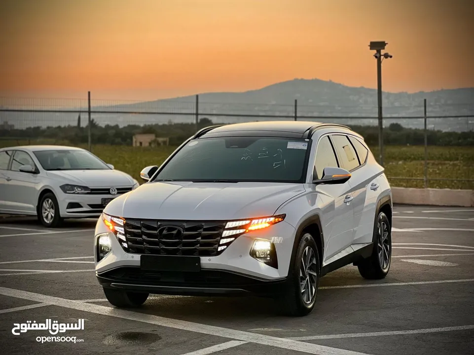 هونداي توسان 2023/ فل الفل فتحة سقف بانوراما  2x4 ///240Hp بنزين + كهرباء  ( Haybrid) 1600cc