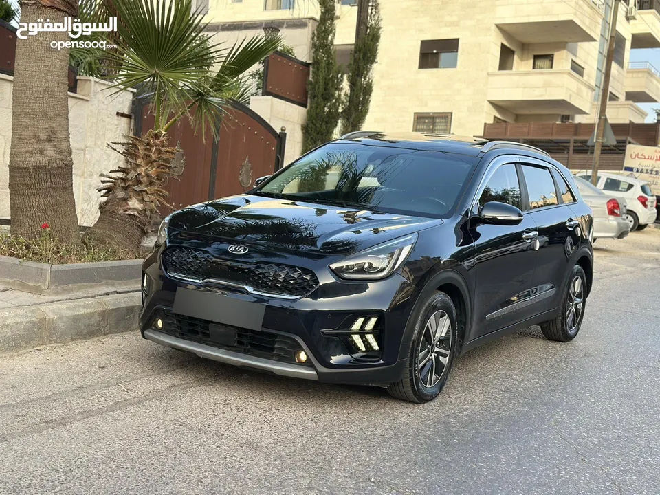 كيا نيرو هايبرد 2020 تورنج فل الفل كاش او اقساط غرفه مميزه لون خمري فتحه