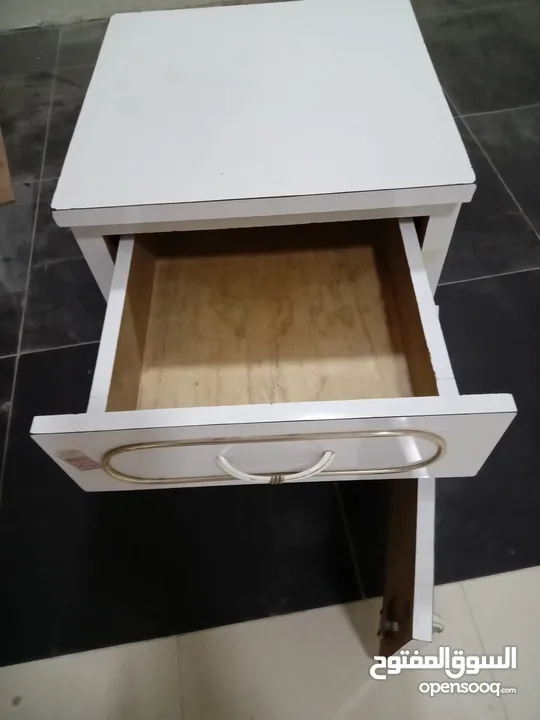 table and cabinet and teapoy