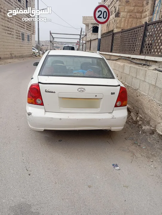 سيارة هونداي فيرنا 2003ميكانيكيات جيدة جدا وعيوب بسيطة بالبودي
