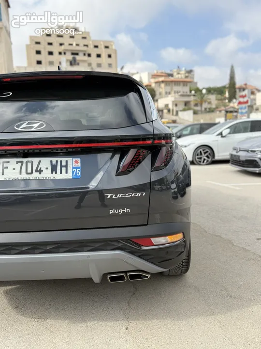 هونداي توسان ترخيص 2022 محرك 1600 هايبرد plug in/يقطع على الشحنه 65 كيلو متر