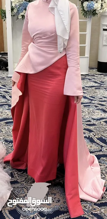 Designed by a pro designer  Fit size small  Very elegant  Clean in perfect condition