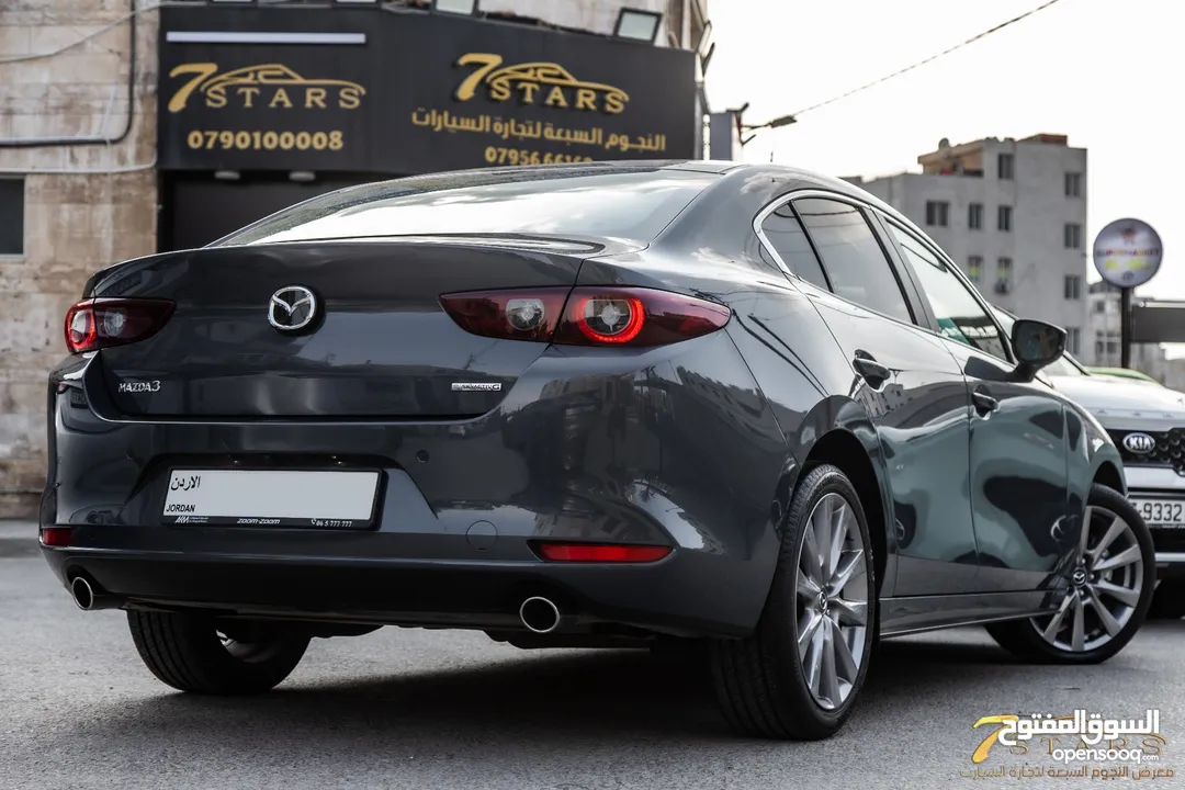 Mazda 3 2023 Skyactiv   السيارة وارد و كفالة الشركة و صيانة الشركة و قطعت مسافة 11,000 كم فقط