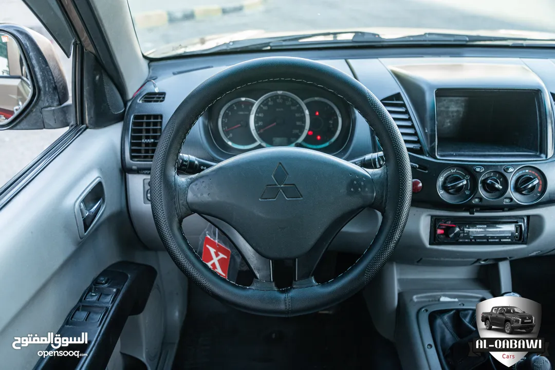 Mitsubishi L200 2013   البكب بحالة ممتازة