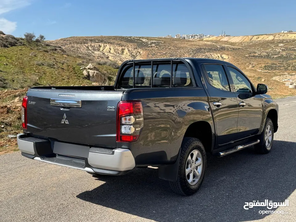 Mitsubishi (L200) 2021 Mark 2 ( مستعمل )  البكب وارد الشركة مالك اول و قطع مسافة100 الف كم فقط ‏