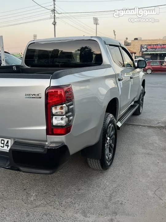 ميتسوبيشي L200 223 زيرو مرتجع ماشي 15 فقط بلاك ايدشن فحص كامل وله ملاحضه