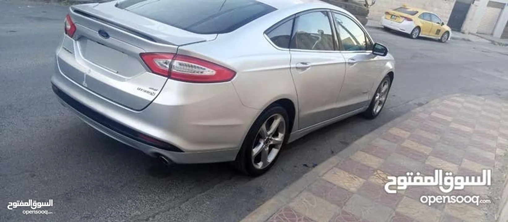 فورد فيوجن 2014 هايبرد كلين فحص كامل لون سلفر بحالة الوكالة